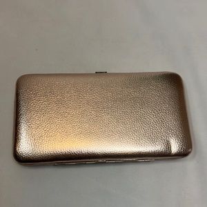 Rose gold hard case clutch/wallet
